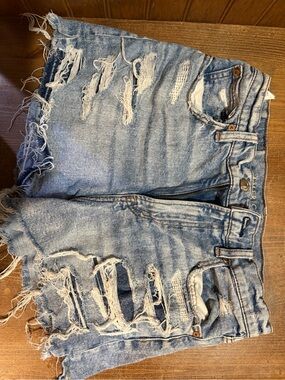 American Eagle Outfitters light blue distressed denim shorts